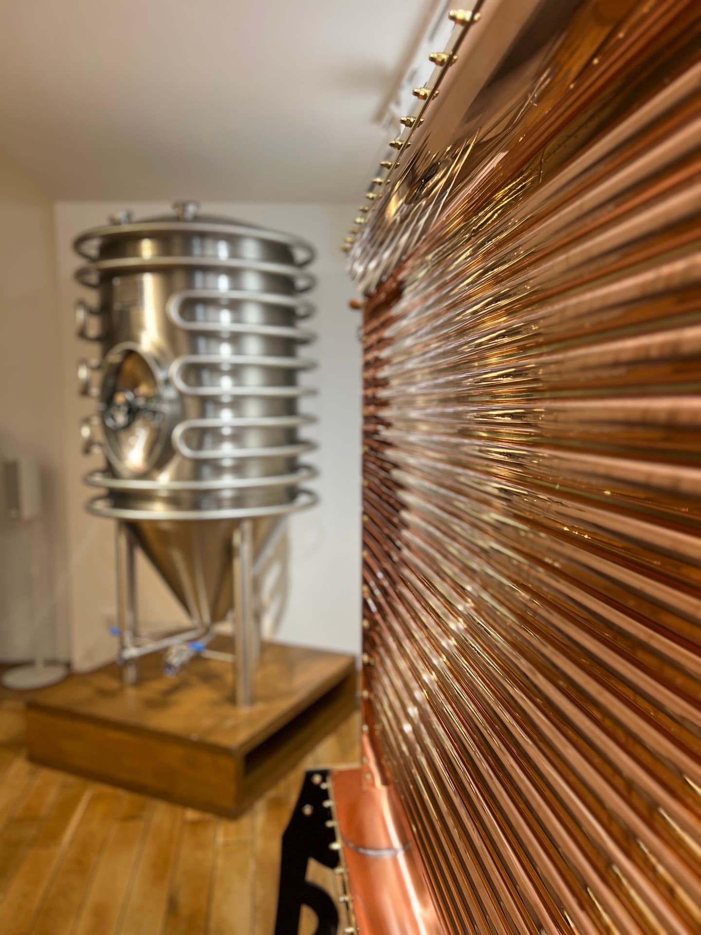 Fermentation tank and copper piping in the exhibit