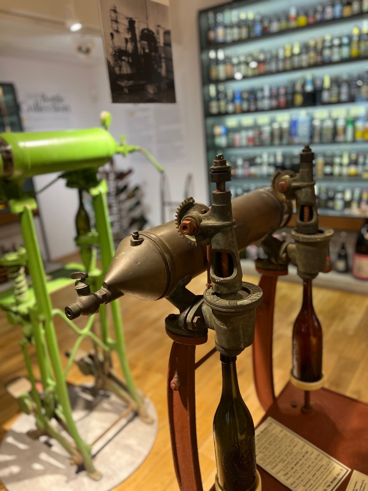 Historic bottling machines by the bottle wall